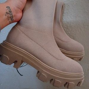 Taupe colored knee high boots